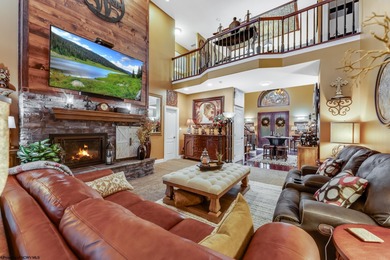 Sheathed in an exquisite brick exterior, this luxurious custom on Lakeview Golf Resort and Spa - Lakeview in West Virginia - for sale on GolfHomes.com, golf home, golf lot