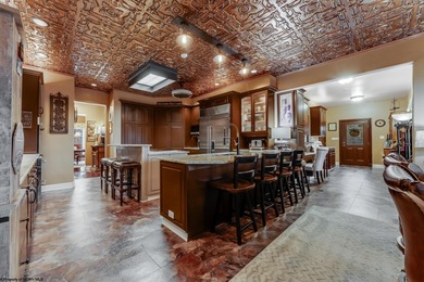 Sheathed in an exquisite brick exterior, this luxurious custom on Lakeview Golf Resort and Spa - Lakeview in West Virginia - for sale on GolfHomes.com, golf home, golf lot