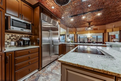 Sheathed in an exquisite brick exterior, this luxurious custom on Lakeview Golf Resort and Spa - Lakeview in West Virginia - for sale on GolfHomes.com, golf home, golf lot
