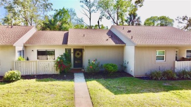 WELCOME to this bright and spacious villa located in the HIGHLY on East Lake Woodlands Country Club in Florida - for sale on GolfHomes.com, golf home, golf lot