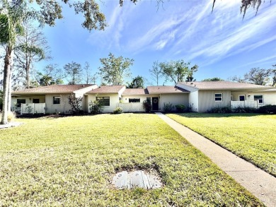 WELCOME to this bright and spacious villa located in the HIGHLY on East Lake Woodlands Country Club in Florida - for sale on GolfHomes.com, golf home, golf lot