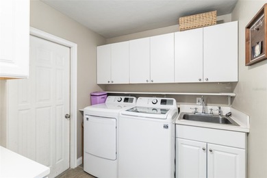 This stunning former builder's model home by Robinshore is on Haile Plantation Golf and Country Club in Florida - for sale on GolfHomes.com, golf home, golf lot