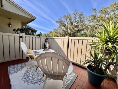 WELCOME to this bright and spacious villa located in the HIGHLY on East Lake Woodlands Country Club in Florida - for sale on GolfHomes.com, golf home, golf lot