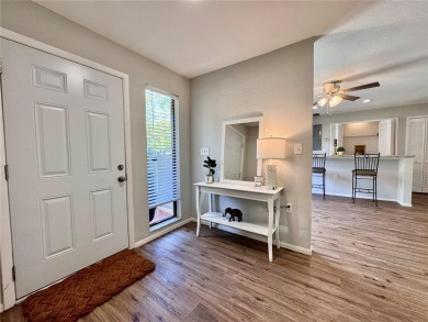 WELCOME to this bright and spacious villa located in the HIGHLY on East Lake Woodlands Country Club in Florida - for sale on GolfHomes.com, golf home, golf lot