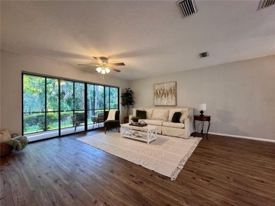 WELCOME to this bright and spacious villa located in the HIGHLY on East Lake Woodlands Country Club in Florida - for sale on GolfHomes.com, golf home, golf lot