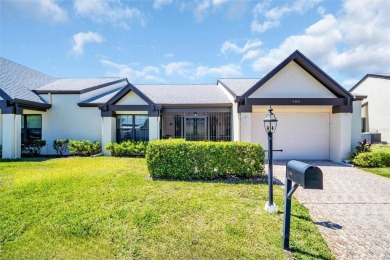 Under contract-accepting backup offers. This beautiful end-unit on Highland Lakes Executive Golf Course in Florida - for sale on GolfHomes.com, golf home, golf lot