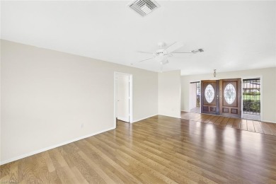 LOWEST PRICED HOME IN RIVIERA GOLF ESTATES! Nestled in this on Riviera Golf Club in Florida - for sale on GolfHomes.com, golf home, golf lot