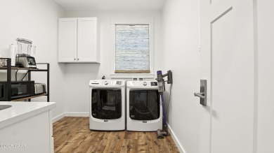 Welcome to coastal luxury in Sanctuary Beach--where nature on Bay Point Resort Golf Club in Florida - for sale on GolfHomes.com, golf home, golf lot