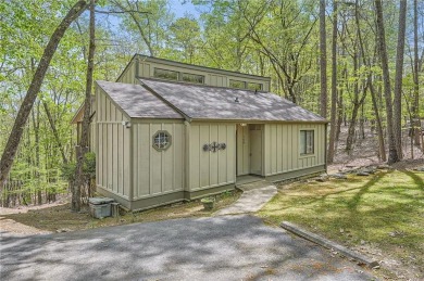 Welcome home to this beautiful contemporary with SEASONAL LAKE on The Highlands Course at Lake Arrowhead in Georgia - for sale on GolfHomes.com, golf home, golf lot