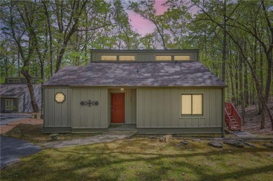 Welcome home to this beautiful contemporary with SEASONAL LAKE on The Highlands Course at Lake Arrowhead in Georgia - for sale on GolfHomes.com, golf home, golf lot