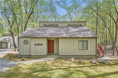 Welcome home to this beautiful contemporary with SEASONAL LAKE on The Highlands Course at Lake Arrowhead in Georgia - for sale on GolfHomes.com, golf home, golf lot