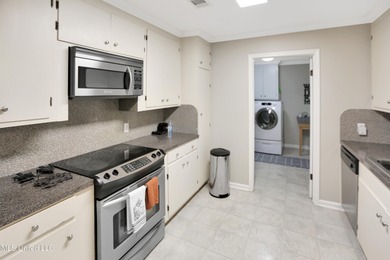 Move-in ready and beautifully updated, this 4-bedroom, 2-bath on Colonial Country Club Deerfield in Mississippi - for sale on GolfHomes.com, golf home, golf lot