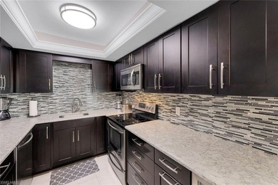 Discover this charming 2-bed, 2-bath villa in the Bundled Golf on The Glades Golf and Country Club in Florida - for sale on GolfHomes.com, golf home, golf lot