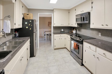 Move-in ready and beautifully updated, this 4-bedroom, 2-bath on Colonial Country Club Deerfield in Mississippi - for sale on GolfHomes.com, golf home, golf lot