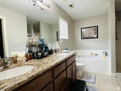 Located in a serene gated community, this beautifully designed on Mulligans Golf and Game in Utah - for sale on GolfHomes.com, golf home, golf lot