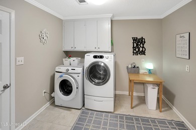 Move-in ready and beautifully updated, this 4-bedroom, 2-bath on Colonial Country Club Deerfield in Mississippi - for sale on GolfHomes.com, golf home, golf lot