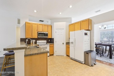 Welcome to this charming and cozy 4-bedroom, 3-bath home located on Julington Creek Golf Club in Florida - for sale on GolfHomes.com, golf home, golf lot