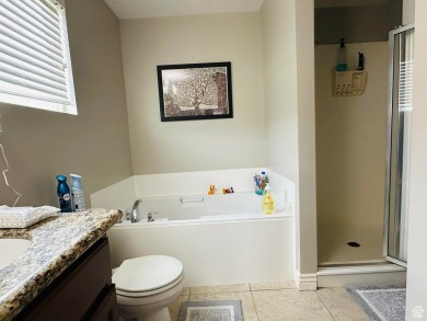 Located in a serene gated community, this beautifully designed on Mulligans Golf and Game in Utah - for sale on GolfHomes.com, golf home, golf lot