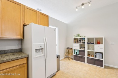 Welcome to this charming and cozy 4-bedroom, 3-bath home located on Julington Creek Golf Club in Florida - for sale on GolfHomes.com, golf home, golf lot