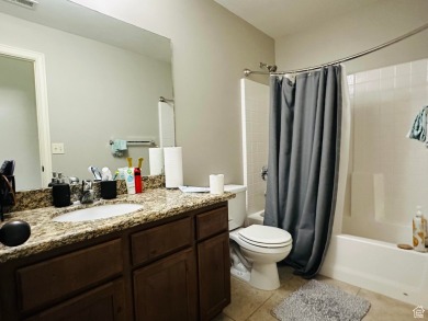 Located in a serene gated community, this beautifully designed on Mulligans Golf and Game in Utah - for sale on GolfHomes.com, golf home, golf lot
