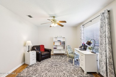 Welcome to this charming and cozy 4-bedroom, 3-bath home located on Julington Creek Golf Club in Florida - for sale on GolfHomes.com, golf home, golf lot
