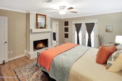 Move-in ready and beautifully updated, this 4-bedroom, 2-bath on Colonial Country Club Deerfield in Mississippi - for sale on GolfHomes.com, golf home, golf lot