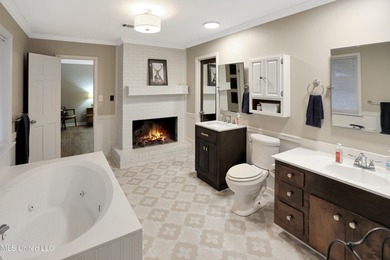 Move-in ready and beautifully updated, this 4-bedroom, 2-bath on Colonial Country Club Deerfield in Mississippi - for sale on GolfHomes.com, golf home, golf lot