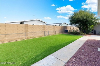 Tucked inside the desirable 55+ community of The Villages at on Quail Wood Greens Golf Course in Arizona - for sale on GolfHomes.com, golf home, golf lot