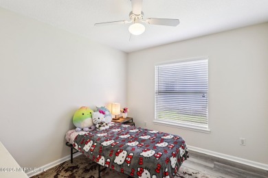 Welcome to this charming and cozy 4-bedroom, 3-bath home located on Julington Creek Golf Club in Florida - for sale on GolfHomes.com, golf home, golf lot
