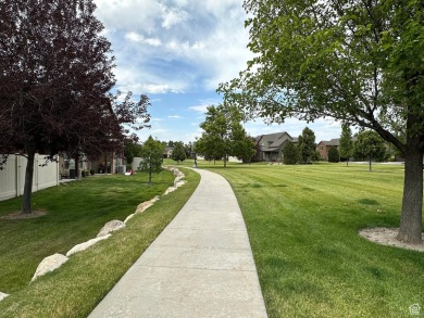 Located in a serene gated community, this beautifully designed on Mulligans Golf and Game in Utah - for sale on GolfHomes.com, golf home, golf lot