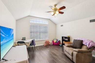Welcome to this charming and cozy 4-bedroom, 3-bath home located on Julington Creek Golf Club in Florida - for sale on GolfHomes.com, golf home, golf lot