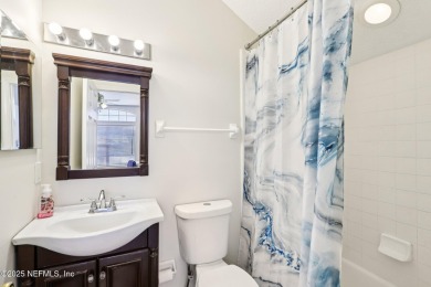Welcome to this charming and cozy 4-bedroom, 3-bath home located on Julington Creek Golf Club in Florida - for sale on GolfHomes.com, golf home, golf lot