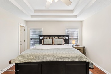 Welcome to this charming and cozy 4-bedroom, 3-bath home located on Julington Creek Golf Club in Florida - for sale on GolfHomes.com, golf home, golf lot