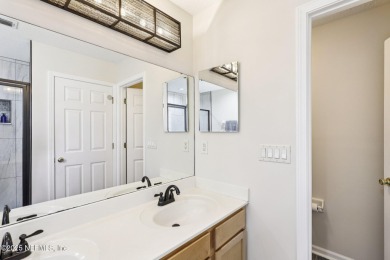 Welcome to this charming and cozy 4-bedroom, 3-bath home located on Julington Creek Golf Club in Florida - for sale on GolfHomes.com, golf home, golf lot