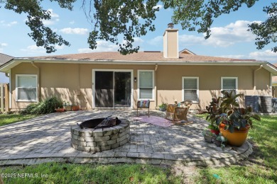 Welcome to this charming and cozy 4-bedroom, 3-bath home located on Julington Creek Golf Club in Florida - for sale on GolfHomes.com, golf home, golf lot