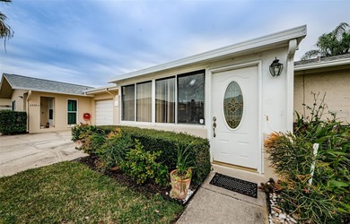 Beautiful Palm Harbor Villa!  No Flood Zone and No Land Lease! on Highland Lakes Executive Golf Course in Florida - for sale on GolfHomes.com, golf home, golf lot