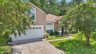 Welcome to this charming and cozy 4-bedroom, 3-bath home located on Julington Creek Golf Club in Florida - for sale on GolfHomes.com, golf home, golf lot