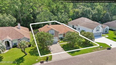 Welcome to this charming and cozy 4-bedroom, 3-bath home located on Julington Creek Golf Club in Florida - for sale on GolfHomes.com, golf home, golf lot