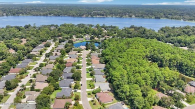 Welcome to this charming and cozy 4-bedroom, 3-bath home located on Julington Creek Golf Club in Florida - for sale on GolfHomes.com, golf home, golf lot
