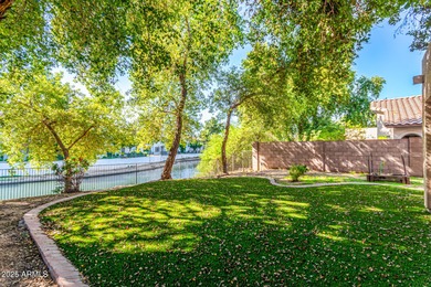 Welcome to your charming lakefront retreat! This warm, inviting on The Legend at Arrowhead in Arizona - for sale on GolfHomes.com, golf home, golf lot