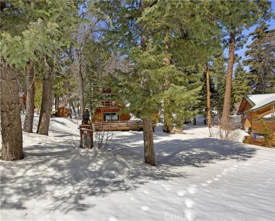 Nestled in the charming Moonridge community of Big Bear, this on Big Bear Mountain Ski and Golf Resort in California - for sale on GolfHomes.com, golf home, golf lot