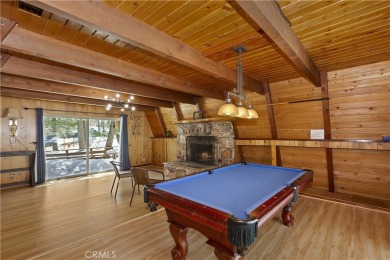 Nestled in the charming Moonridge community of Big Bear, this on Big Bear Mountain Ski and Golf Resort in California - for sale on GolfHomes.com, golf home, golf lot