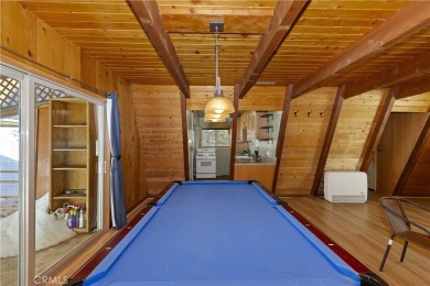 Nestled in the charming Moonridge community of Big Bear, this on Big Bear Mountain Ski and Golf Resort in California - for sale on GolfHomes.com, golf home, golf lot