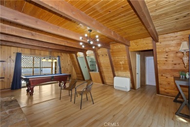 Nestled in the charming Moonridge community of Big Bear, this on Big Bear Mountain Ski and Golf Resort in California - for sale on GolfHomes.com, golf home, golf lot