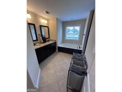 Midland, GA (Harris County) 4 Bed | 2.5 Bath | Waterfront on Woodlands Hills Golf Course in Georgia - for sale on GolfHomes.com, golf home, golf lot
