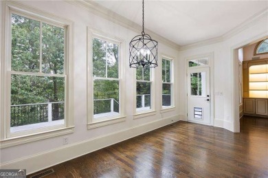 Welcome to 6186 Talmadge Run-an elegant retreat tucked inside on The Governors Towne Club in Georgia - for sale on GolfHomes.com, golf home, golf lot