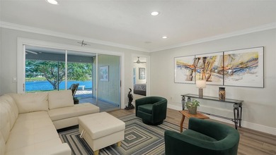 Welcome to Jacaranda West, where this premier peninsula homesite on Jacaranda West Country Club in Florida - for sale on GolfHomes.com, golf home, golf lot