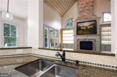 Welcome to 6186 Talmadge Run-an elegant retreat tucked inside on The Governors Towne Club in Georgia - for sale on GolfHomes.com, golf home, golf lot