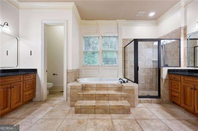 Welcome to 6186 Talmadge Run-an elegant retreat tucked inside on The Governors Towne Club in Georgia - for sale on GolfHomes.com, golf home, golf lot