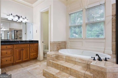Welcome to 6186 Talmadge Run-an elegant retreat tucked inside on The Governors Towne Club in Georgia - for sale on GolfHomes.com, golf home, golf lot